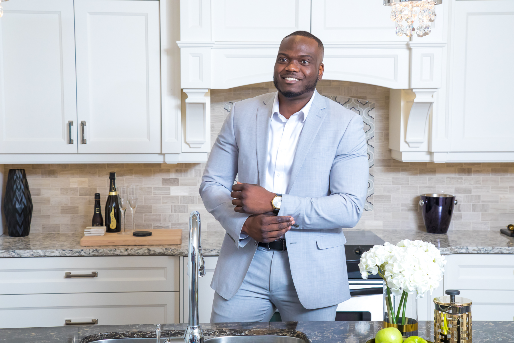 Kenneth Toppin smiling in the kitchen of a Durham Region home