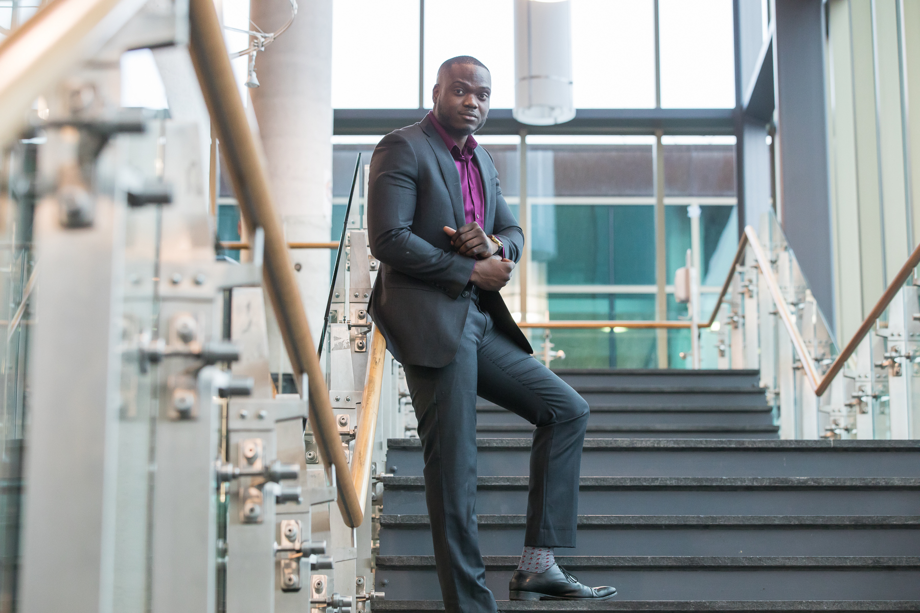 Kenneth Toppin, Durham Region Realtor, in a modern office atrium